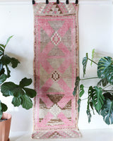 Vintage Turkish runner rug in living room setting, old rug, antique rug, pastel colors, faded colors, Turkish rug, vintage rug, soft rug, Portland, Oregon, rug store, rug shop, local shop