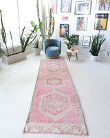 Vintage Turkish runner rug in living room setting, old rug, antique rug, pastel colors, faded colors, Turkish rug, vintage rug, soft rug, Portland, Oregon, rug store, rug shop, local shop