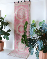 Vintage Turkish runner rug in living room setting, old rug, antique rug, pastel colors, faded colors, Turkish rug, vintage rug, soft rug, Portland, Oregon, rug store, rug shop, local shop