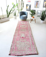 Vintage Turkish runner rug in living room setting, old rug, antique rug, pastel colors, faded colors, Turkish rug, vintage rug, soft rug, Portland, Oregon, rug store, rug shop, local shop