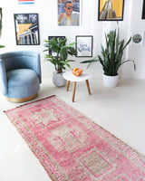 Vintage Turkish runner rug in living room setting, old rug, antique rug, pastel colors, faded colors, Turkish rug, vintage rug, soft rug, Portland, Oregon, rug store, rug shop, local shop