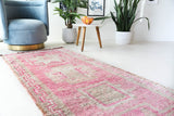 Vintage Turkish runner rug in living room setting, old rug, antique rug, pastel colors, faded colors, Turkish rug, vintage rug, soft rug, Portland, Oregon, rug store, rug shop, local shop