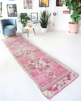 Vintage Turkish runner rug in living room setting, old rug, antique rug, pastel colors, faded colors, Turkish rug, vintage rug, soft rug, Portland, Oregon, rug store, rug shop, local shop