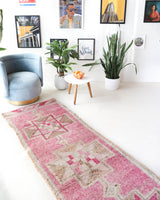 Vintage Turkish runner rug in living room setting, old rug, antique rug, pastel colors, faded colors, Turkish rug, vintage rug, soft rug, Portland, Oregon, rug store, rug shop, local shop
