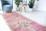 Vintage Turkish runner rug in living room setting, old rug, antique rug, pastel colors, faded colors, Turkish rug, vintage rug, soft rug, Portland, Oregon, rug store, rug shop, local shop