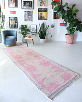 Vintage Turkish runner rug in living room setting, old rug, antique rug, pastel colors, faded colors, Turkish rug, vintage rug, soft rug, Portland, Oregon, rug store, rug shop, local shop