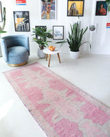 Vintage Turkish runner rug in living room setting, old rug, antique rug, pastel colors, faded colors, Turkish rug, vintage rug, soft rug, Portland, Oregon, rug store, rug shop, local shop
