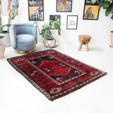 Vintage Turkish rug in a living room setting, pile rug, Turkish rug, vintage rug, portland, rug shop, bright colors, wild shaman, soft rug, bold color, Portland, Oregon, rug store, rug shop, local shop, antique rug