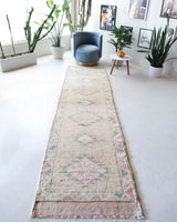Vintage Turkish runner rug in living room setting, old rug, antique rug, pastel colors, faded colors, Turkish rug, vintage rug, soft rug, Portland, Oregon, rug store, rug shop, local shop