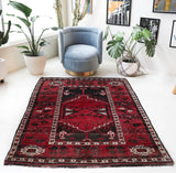 Vintage Turkish rug in a living room setting, pile rug, Turkish rug, vintage rug, portland, rug shop, bright colors, wild shaman, soft rug, bold color, Portland, Oregon, rug store, rug shop, local shop, antique rug
