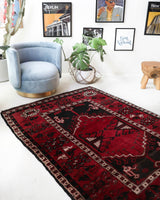 Vintage Turkish rug in a living room setting, pile rug, Turkish rug, vintage rug, portland, rug shop, bright colors, wild shaman, soft rug, bold color, Portland, Oregon, rug store, rug shop, local shop, antique rug