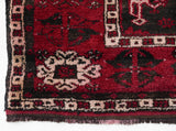 Vintage Turkish rug in a living room setting, pile rug, Turkish rug, vintage rug, portland, rug shop, bright colors, wild shaman, soft rug, bold color, Portland, Oregon, rug store, rug shop, local shop, antique rug