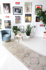 Vintage Turkish runner rug in living room setting, old rug, antique rug, pastel colors, faded colors, Turkish rug, vintage rug, soft rug, Portland, Oregon, rug store, rug shop, local shop