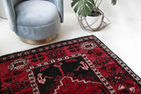Vintage Turkish rug in a living room setting, pile rug, Turkish rug, vintage rug, portland, rug shop, bright colors, wild shaman, soft rug, bold color, Portland, Oregon, rug store, rug shop, local shop, antique rug