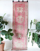 Vintage Turkish runner rug in living room setting, old rug, antique rug, pastel colors, faded colors, Turkish rug, vintage rug, soft rug, Portland, Oregon, rug store, rug shop, local shop