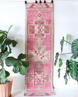 Vintage Turkish runner rug in living room setting, old rug, antique rug, pastel colors, faded colors, Turkish rug, vintage rug, soft rug, Portland, Oregon, rug store, rug shop, local shop