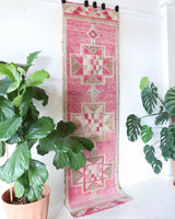 Vintage Turkish runner rug in living room setting, old rug, antique rug, pastel colors, faded colors, Turkish rug, vintage rug, soft rug, Portland, Oregon, rug store, rug shop, local shop