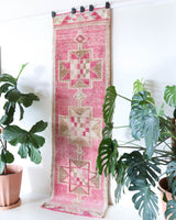 Vintage Turkish runner rug in living room setting, old rug, antique rug, pastel colors, faded colors, Turkish rug, vintage rug, soft rug, Portland, Oregon, rug store, rug shop, local shop