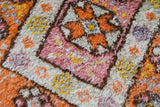 Vintage Turkish rug in a living room setting, pile rug, Turkish rug, vintage rug, portland, rug shop, bright colors, wild shaman, soft rug, bold color, Portland, Oregon, rug store, rug shop, local shop, antique rug