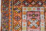 Vintage Turkish rug in a living room setting, pile rug, Turkish rug, vintage rug, portland, rug shop, bright colors, wild shaman, soft rug, bold color, Portland, Oregon, rug store, rug shop, local shop, antique rug