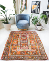 Vintage Turkish rug in a living room setting, pile rug, Turkish rug, vintage rug, portland, rug shop, bright colors, wild shaman, soft rug, bold color, Portland, Oregon, rug store, rug shop, local shop, antique rug