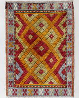 Vintage Turkish rug in a living room setting, pile rug, Turkish rug, vintage rug, portland, rug shop, bright colors, wild shaman, soft rug, bold color, Portland, Oregon, rug store, rug shop, local shop, shag rug, shaggy, plush,tulu rugs