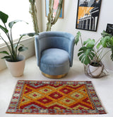 Vintage Turkish rug in a living room setting, pile rug, Turkish rug, vintage rug, portland, rug shop, bright colors, wild shaman, soft rug, bold color, Portland, Oregon, rug store, rug shop, local shop, shag rug, shaggy, plush,tulu rugs
