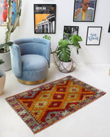 Vintage Turkish rug in a living room setting, pile rug, Turkish rug, vintage rug, portland, rug shop, bright colors, wild shaman, soft rug, bold color, Portland, Oregon, rug store, rug shop, local shop, shag rug, shaggy, plush,tulu rugs