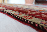 Vintage Turkish rug in a living room setting, pile rug, Turkish rug, vintage rug, portland, rug shop, bright colors, wild shaman, soft rug, bold color, Portland, Oregon, rug store, rug shop, local shop, antique rug