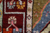 Vintage Turkish rug in a living room setting, pile rug, Turkish rug, vintage rug, portland, rug shop, bright colors, wild shaman, soft rug, bold color, Portland, Oregon, rug store, rug shop, local shop, antique rug