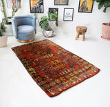 Vintage Turkish rug in a living room setting, pile rug, Turkish rug, vintage rug, portland, rug shop, bright colors, wild shaman, soft rug, bold color, Portland, Oregon, rug store, rug shop, local shop, shag rug, shaggy, plush,tulu rugs