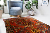 Vintage Turkish rug in a living room setting, pile rug, Turkish rug, vintage rug, portland, rug shop, bright colors, wild shaman, soft rug, bold color, Portland, Oregon, rug store, rug shop, local shop, shag rug, shaggy, plush,tulu rugs