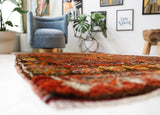 Vintage Turkish rug in a living room setting, pile rug, Turkish rug, vintage rug, portland, rug shop, bright colors, wild shaman, soft rug, bold color, Portland, Oregon, rug store, rug shop, local shop, shag rug, shaggy, plush,tulu rugs