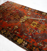 Vintage Turkish rug in a living room setting, pile rug, Turkish rug, vintage rug, portland, rug shop, bright colors, wild shaman, soft rug, bold color, Portland, Oregon, rug store, rug shop, local shop, shag rug, shaggy, plush,tulu rugs