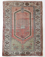Vintage Turkish rug in living room setting, old rug, antique rug, pastel colors, faded colors, Turkish rug, vintage rug, soft rug, Portland, Oregon, rug store, rug shop, local shop