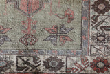 Vintage Turkish rug in living room setting, old rug, antique rug, pastel colors, faded colors, Turkish rug, vintage rug, soft rug, Portland, Oregon, rug store, rug shop, local shop