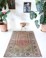 Vintage Turkish rug in living room setting, old rug, antique rug, pastel colors, faded colors, Turkish rug, vintage rug, soft rug, Portland, Oregon, rug store, rug shop, local shop