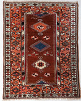 Vintage Turkish rug in a living room setting, pile rug, Turkish rug, vintage rug, portland, rug shop, bright colors, wild shaman, soft rug, bold color, Portland, Oregon, rug store, rug shop, local shop, antique rug