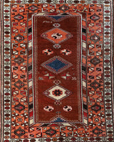 Vintage Turkish rug in a living room setting, pile rug, Turkish rug, vintage rug, portland, rug shop, bright colors, wild shaman, soft rug, bold color, Portland, Oregon, rug store, rug shop, local shop, antique rug