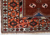 Vintage Turkish rug in a living room setting, pile rug, Turkish rug, vintage rug, portland, rug shop, bright colors, wild shaman, soft rug, bold color, Portland, Oregon, rug store, rug shop, local shop, antique rug
