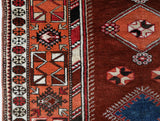 Vintage Turkish rug in a living room setting, pile rug, Turkish rug, vintage rug, portland, rug shop, bright colors, wild shaman, soft rug, bold color, Portland, Oregon, rug store, rug shop, local shop, antique rug