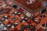 Vintage Turkish rug in a living room setting, pile rug, Turkish rug, vintage rug, portland, rug shop, bright colors, wild shaman, soft rug, bold color, Portland, Oregon, rug store, rug shop, local shop, antique rug
