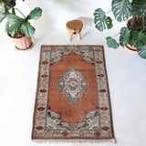 Vintage Turkish rug in a living room setting, pile rug, Turkish rug, vintage rug, portland, rug shop, bright colors, wild shaman, soft rug, bold color, Portland, Oregon, rug store, rug shop, local shop, antique rug