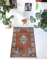 Vintage Turkish rug in a living room setting, pile rug, Turkish rug, vintage rug, portland, rug shop, bright colors, wild shaman, soft rug, bold color, Portland, Oregon, rug store, rug shop, local shop, antique rug