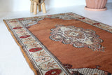 Vintage Turkish rug in a living room setting, pile rug, Turkish rug, vintage rug, portland, rug shop, bright colors, wild shaman, soft rug, bold color, Portland, Oregon, rug store, rug shop, local shop, antique rug