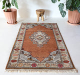 Vintage Turkish rug in a living room setting, pile rug, Turkish rug, vintage rug, portland, rug shop, bright colors, wild shaman, soft rug, bold color, Portland, Oregon, rug store, rug shop, local shop, antique rug