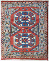 Vintage Turkish rug in living room setting, old rug, antique rug, pastel colors, faded colors, Turkish rug, vintage rug, soft rug, Portland, Oregon, rug store, rug shop, local shop