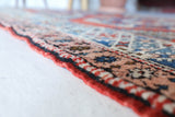 Vintage Turkish rug in living room setting, old rug, antique rug, pastel colors, faded colors, Turkish rug, vintage rug, soft rug, Portland, Oregon, rug store, rug shop, local shop