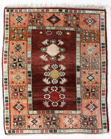 Vintage Turkish rug in a living room setting, pile rug, Turkish rug, vintage rug, portland, rug shop, bright colors, wild shaman, soft rug, bold color, Portland, Oregon, rug store, rug shop, local shop, antique rug