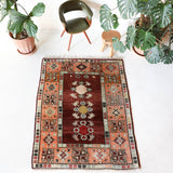 Vintage Turkish rug in a living room setting, pile rug, Turkish rug, vintage rug, portland, rug shop, bright colors, wild shaman, soft rug, bold color, Portland, Oregon, rug store, rug shop, local shop, antique rug